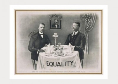 Booker T. Washington y Theodore Roosevelt a la mesa.jpg