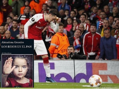 Ozil Atletico Madrid besa pan.jpg